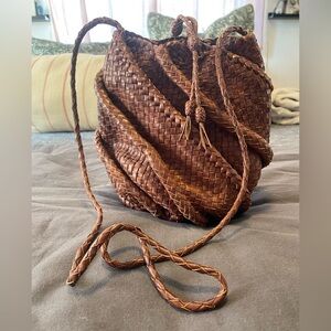 Gorgeous signed leather woven bucket bag!